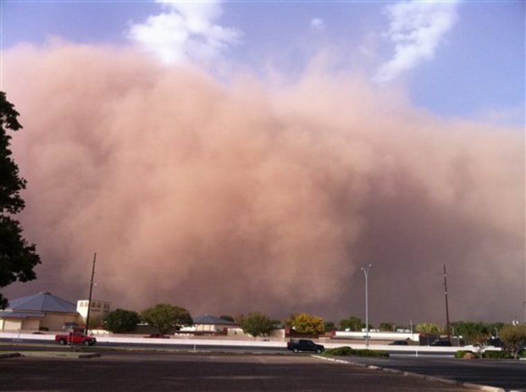 A billowing wall of red dust approaching Lubbock, Texas, on Monday. Meteorologists say people living on the parched High Plains of Texas could see more of the massive dust storms reminiscent of the Dust Bowl years as a record drought tightens its grip across the Southwest.